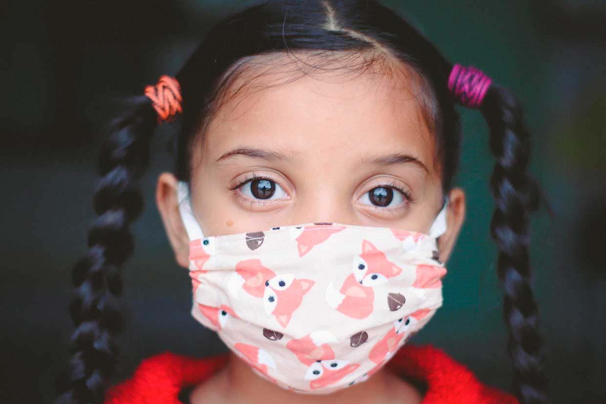 Medidas preventivas contra el COVID-19 para niños que padecen enfermedades respiratorias en la entrada a clases